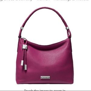 Michael kors purse. Size medium